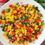 The salad in a white salad bowl.