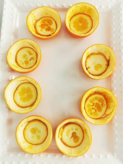orange peel cups on white serving platter
