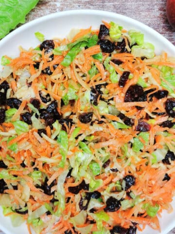 Sweet Carrot Salad in a white salad bowl.