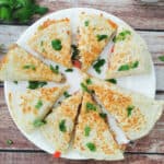 sliced Crispy Breakfast Quesadilla in a white plate.