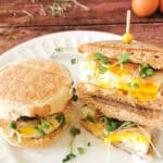 Broccoli Microgreens Breakfast Sandwich on a white plate.
