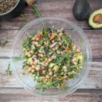 Chickpea Salad With Avocado and Quinoa in a large glass mixing bowl.