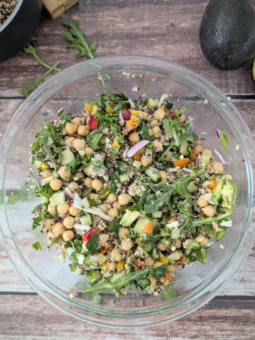 Chickpea Salad With Avocado and Quinoa in a large glass mixing bowl.