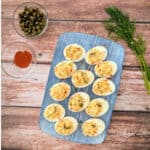 Passover Salmon Deviled Eggs on a blue platter.