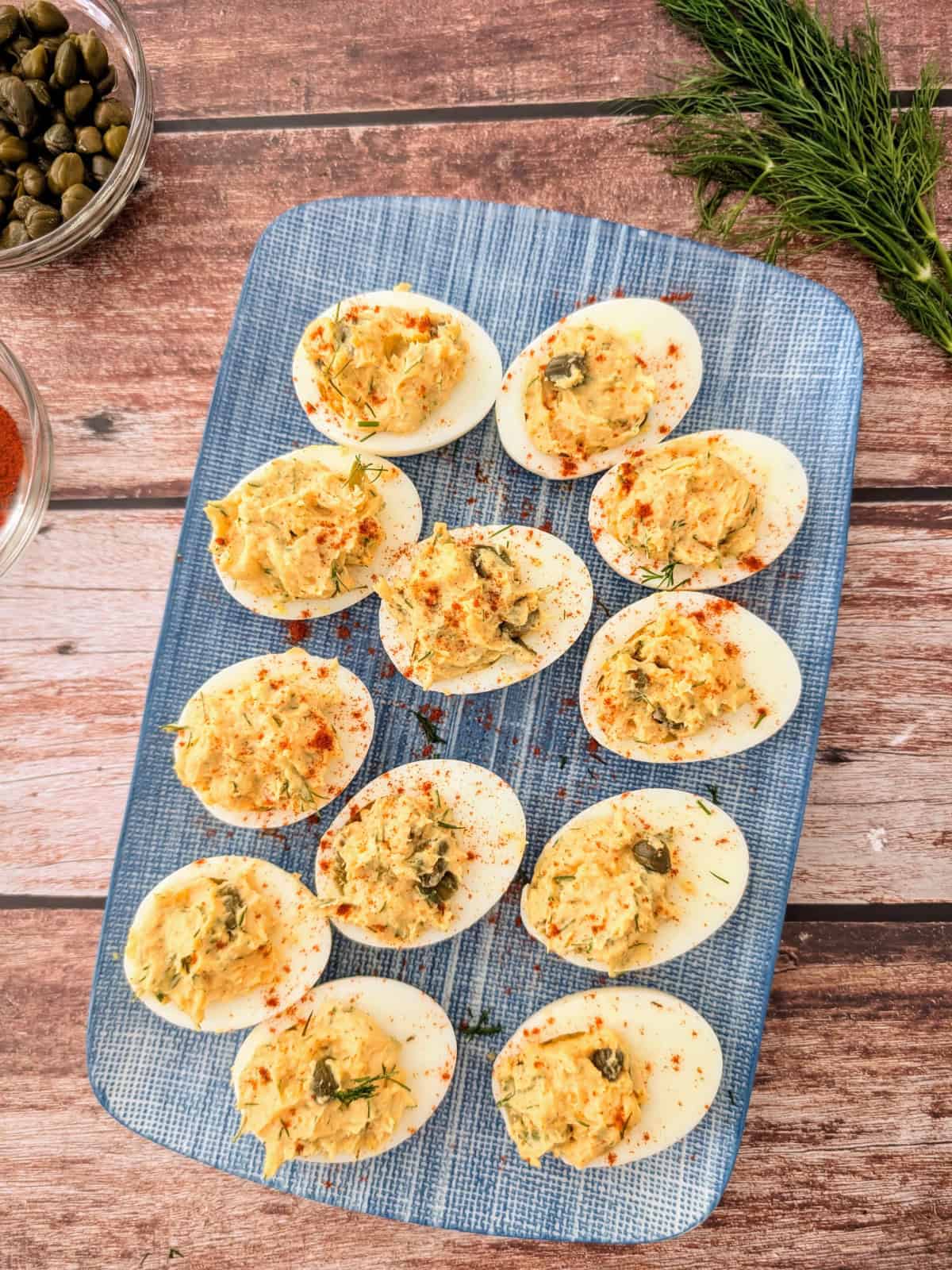 Passover Salmon Deviled Eggs on a blue platter.