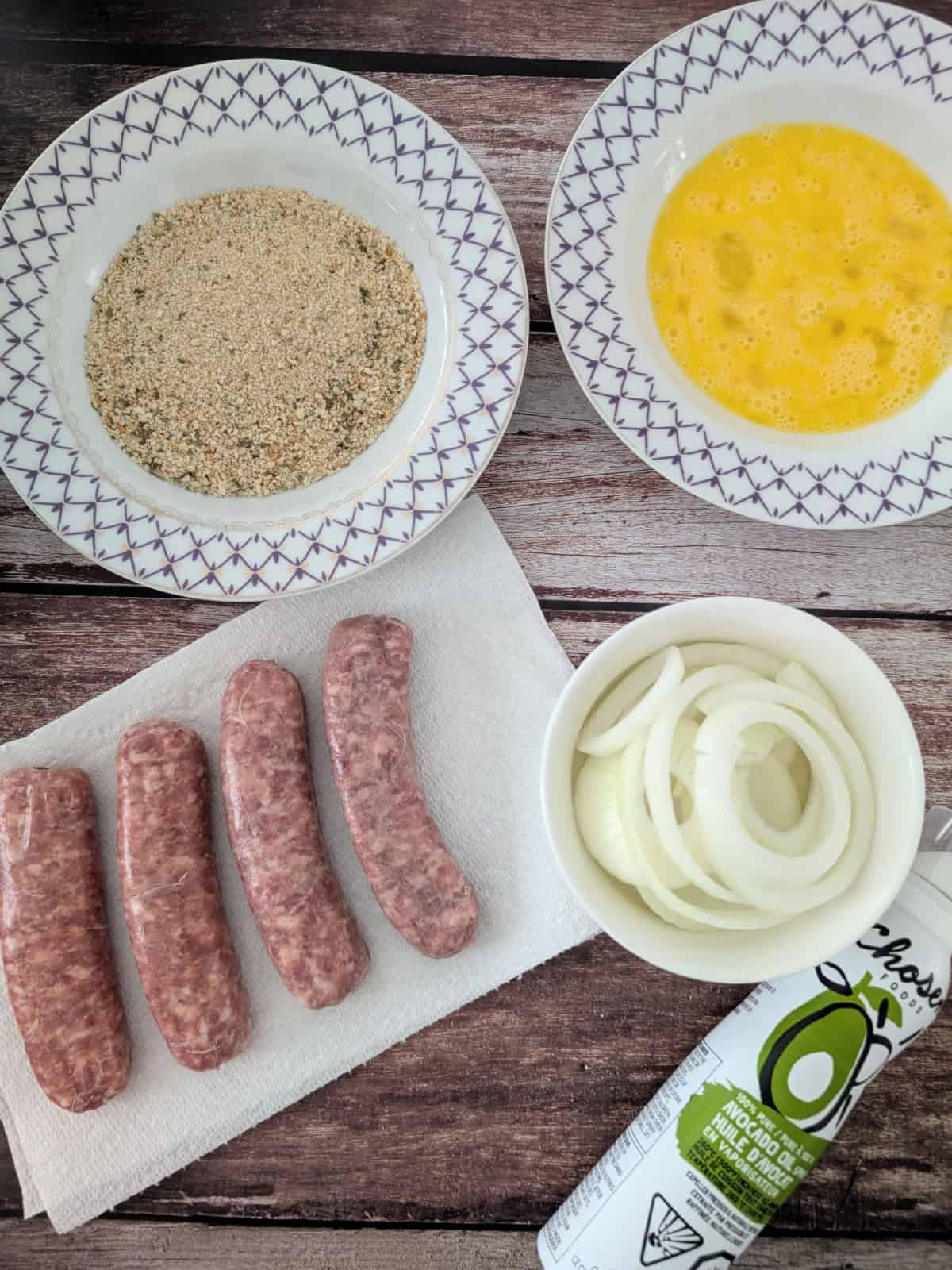 prepared ingredients for onion ring and sausage recipe.