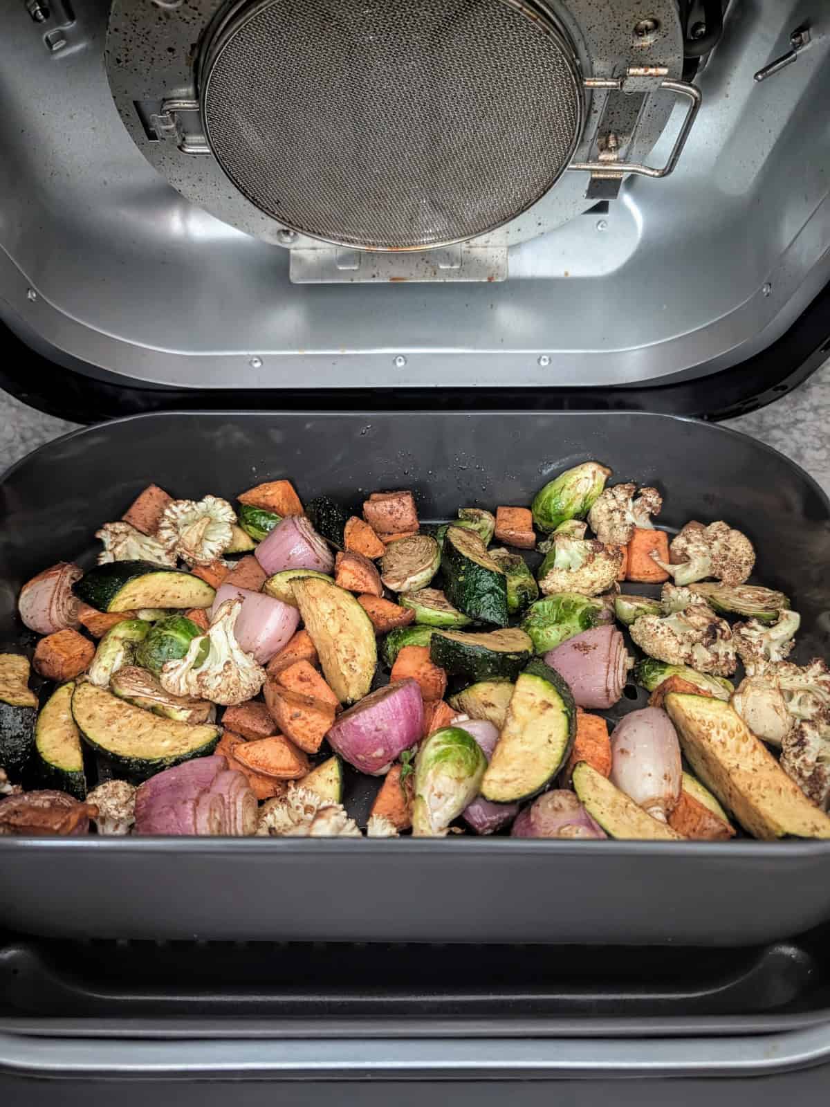 Roasted Vegetables with Sweet Potatoes & Shallots in an air fryer.