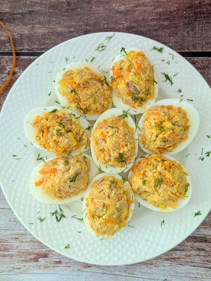 5-Ingredient Tuna Salad Deviled Eggs on a white plate.