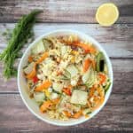 One-Pot Vegetable Pasta Salad with Ribbon-Style Veggies in a white salad bowl.