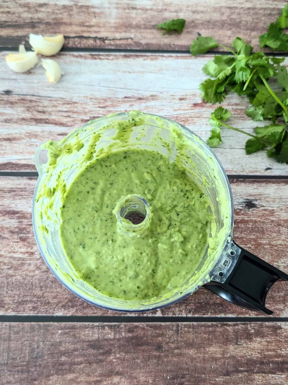 avocado lime ranch dressing with cilantro and garlic on the side.