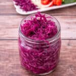 pickled red cabbage in a glass jar.