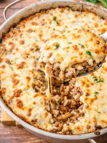 Ground Beef & Rice Casserole in a stainless steel pan.