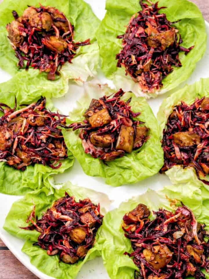 Leftover Chicken Lettuce Wraps with Beet & Cabbage Slaw on a large plate.