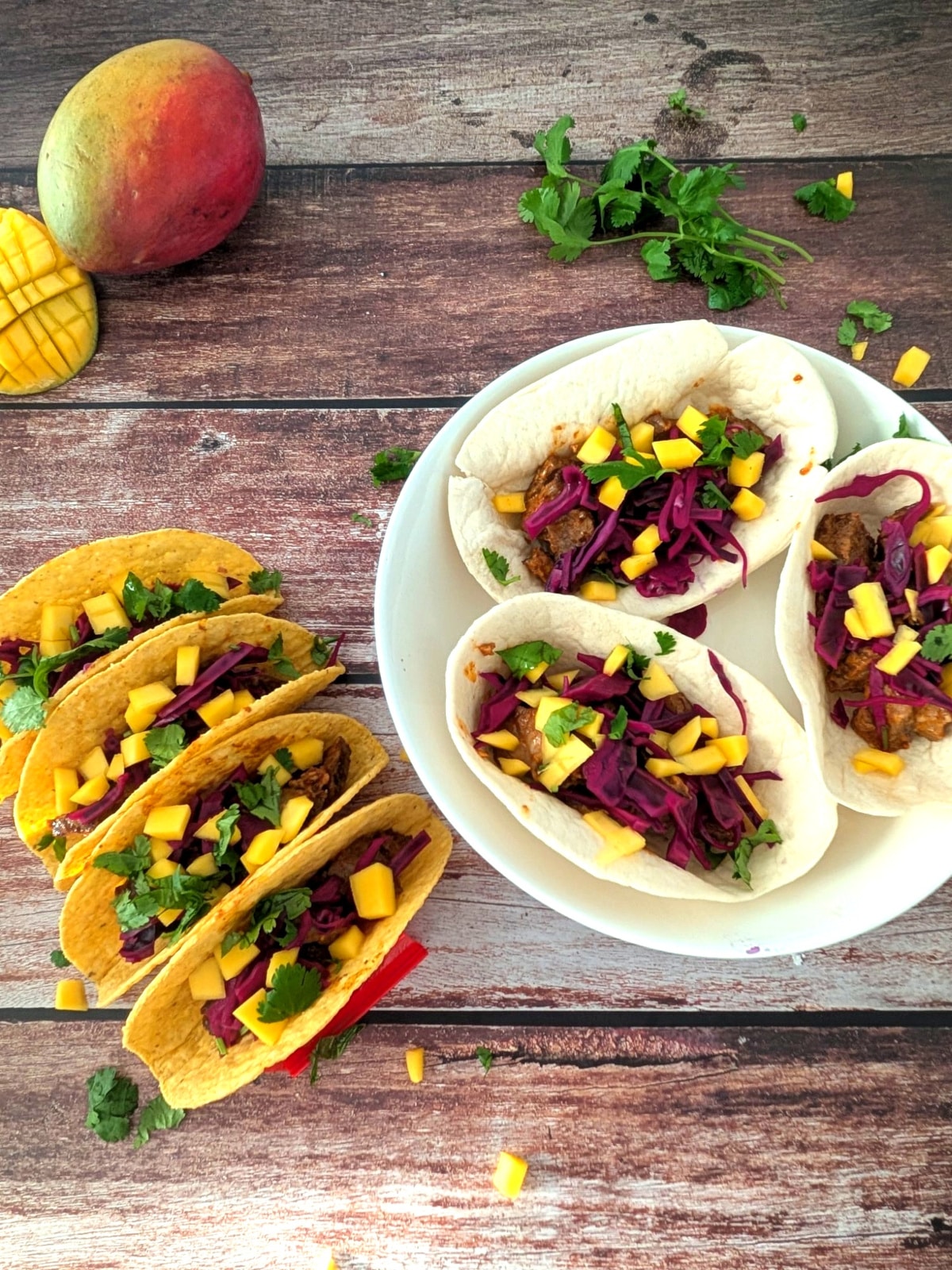 Leftover steak tacos with mango and pickled red cabbage in corn and flour tortillas.