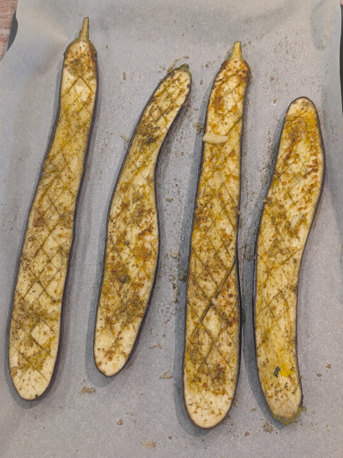 roasted Japanese eggplant ready for Parmesan cheese.