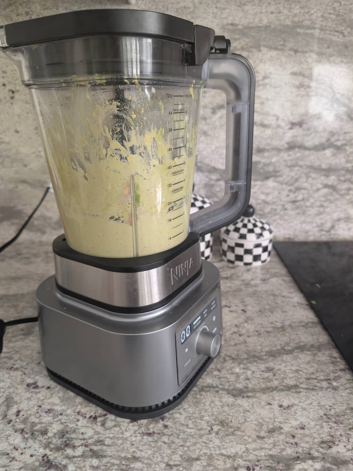 all ingredients of lentil dip with tahini blending in a blender.