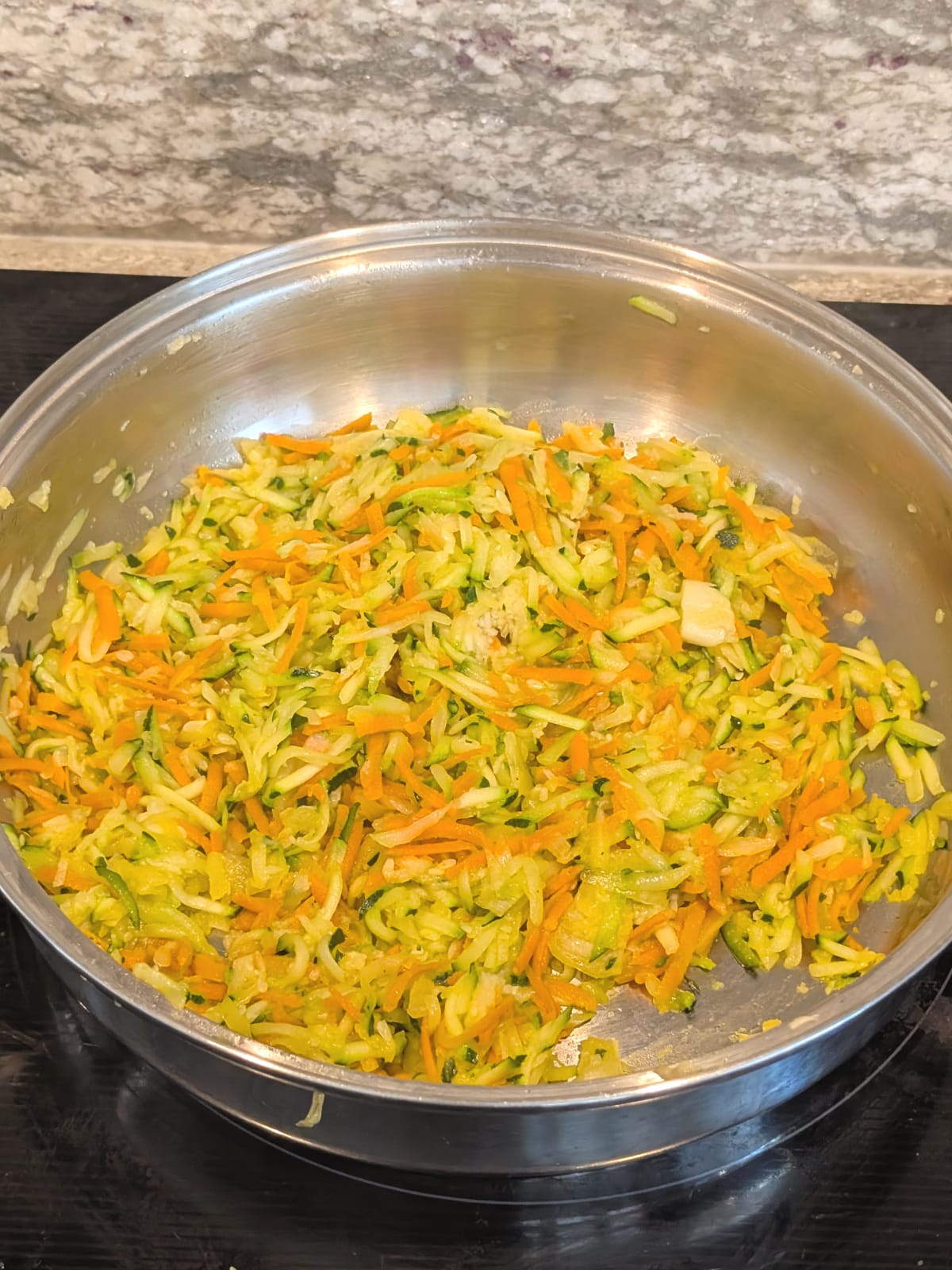 Sautéed zucchini, carrots and onion for quinoa zucchini meatloaf.