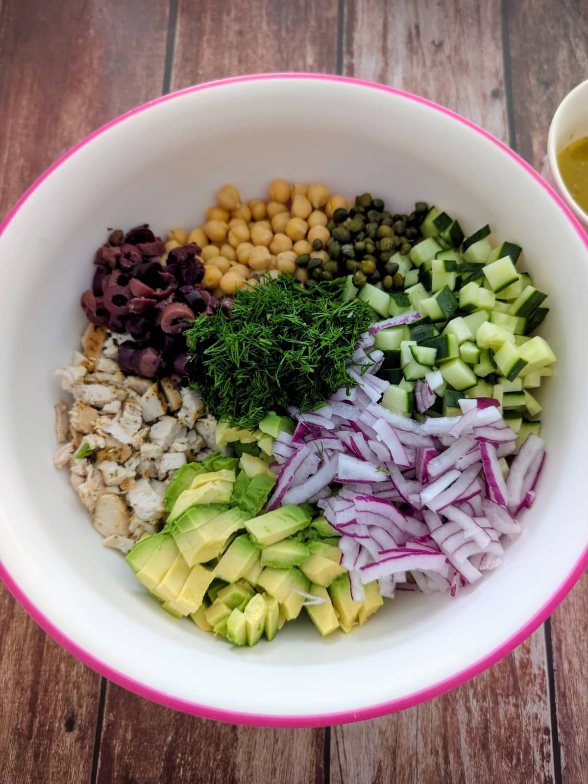 all ingredients of chicken salad in a large mixing bowl.
