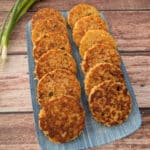 Crispy Rice Fritters served on a blue platter.