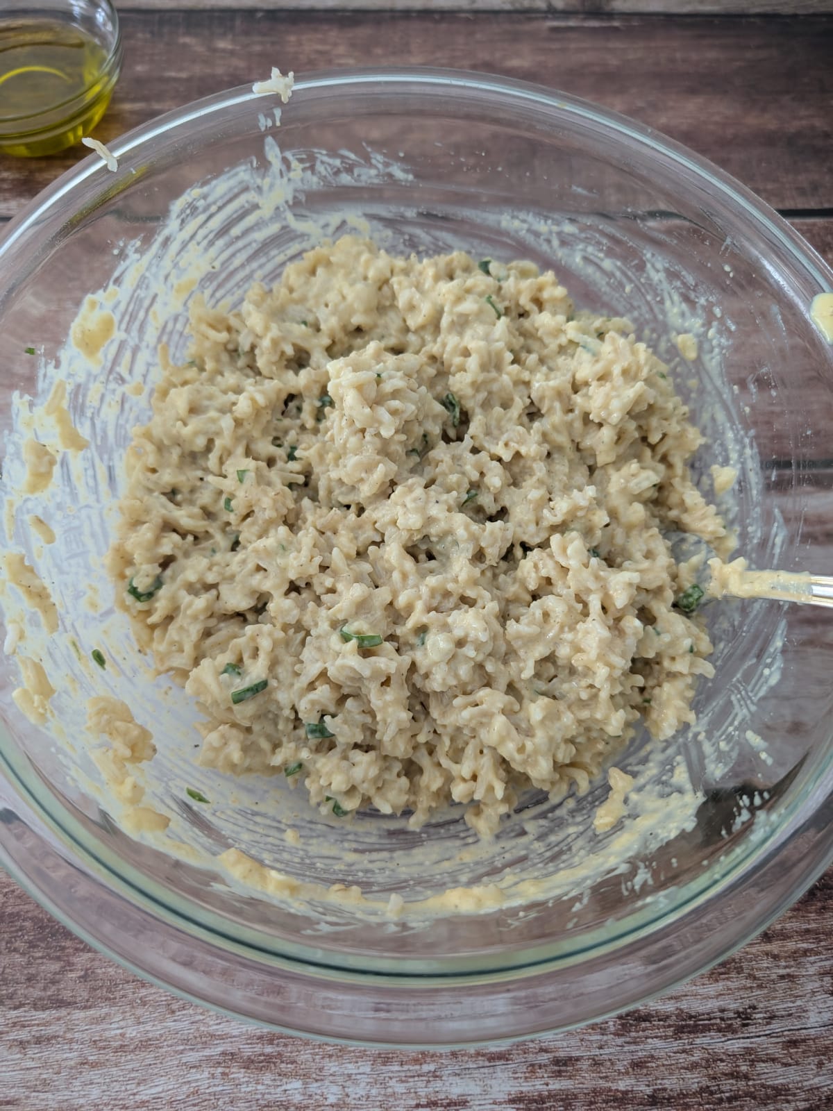 Rice fritter mixture combined with cooked rice, Parmesan, green onions, and blended oat mixture.
